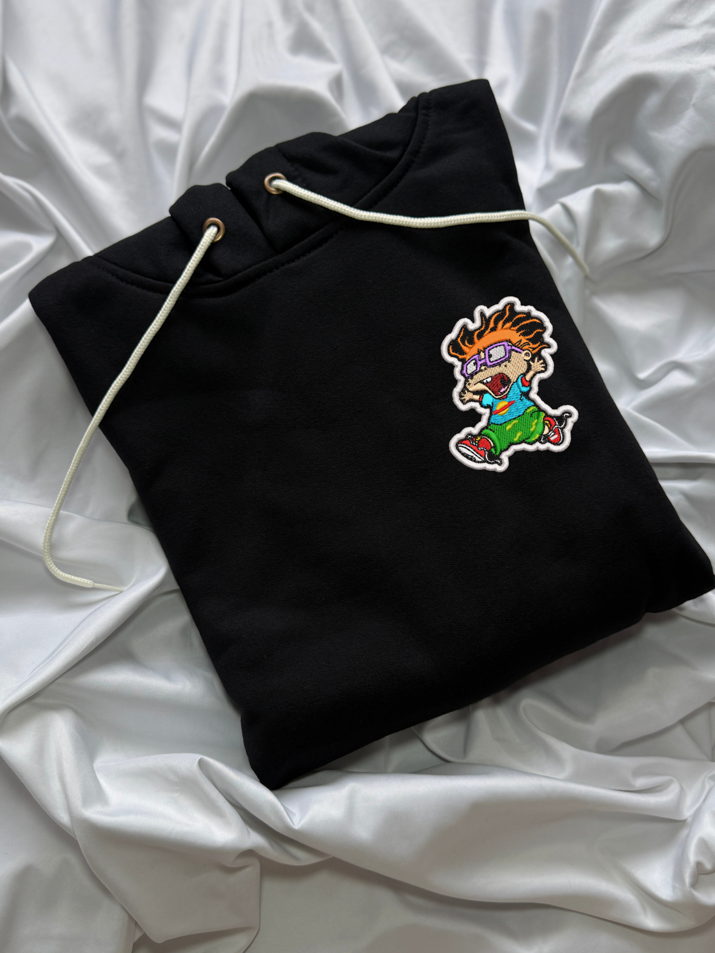 Hoodie carlitos aventuras en pañales bordado