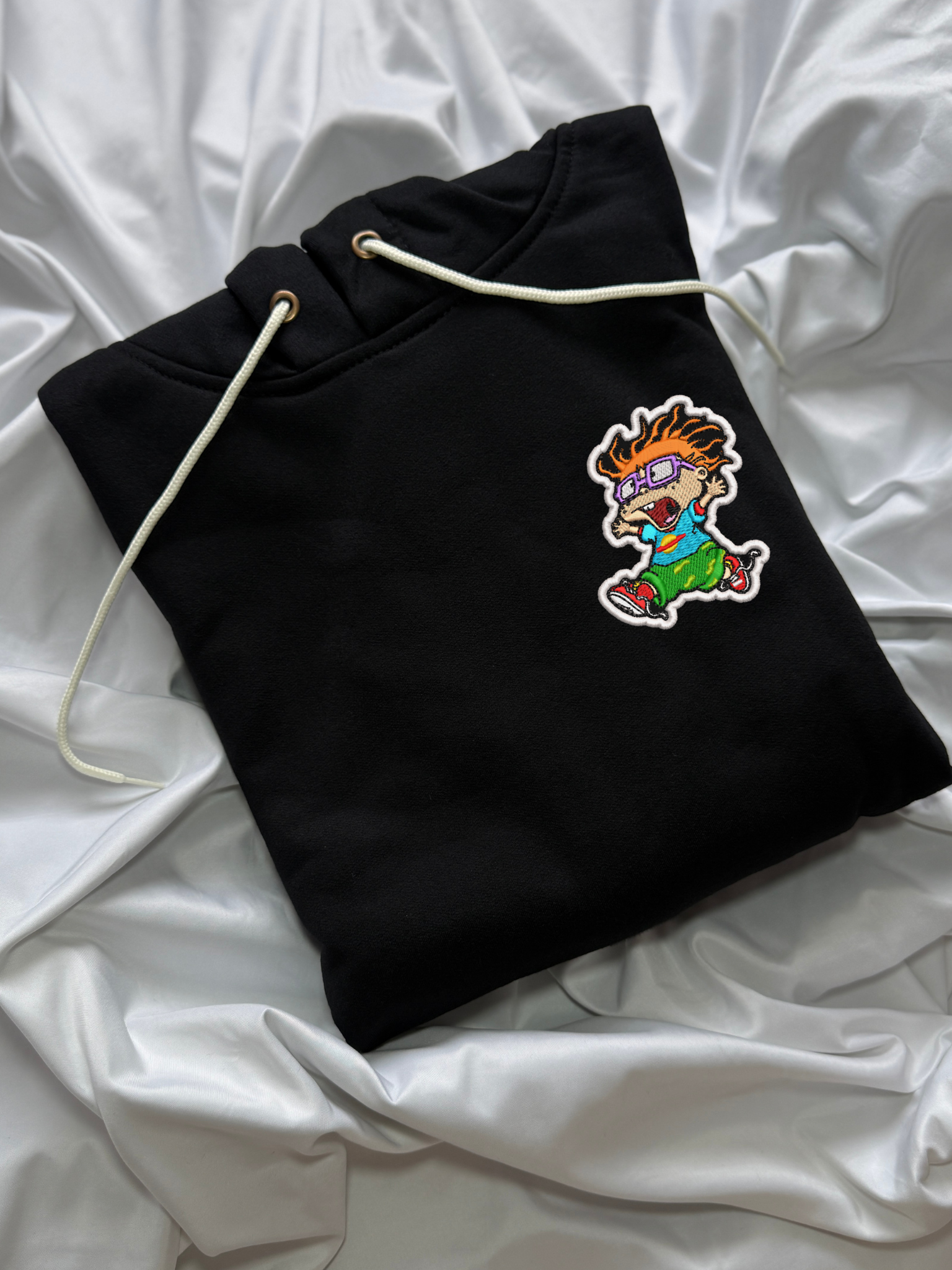 Hoodie carlitos aventuras en pañales bordado
