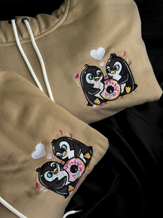Hoodie dos Pingüinos una dona