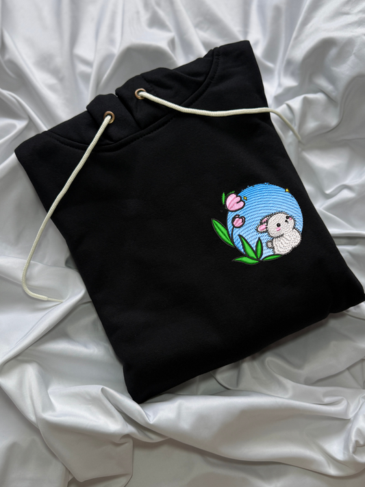 Hoodie conejito en la pradera