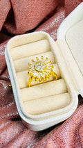 Anillo girasol dorado giratorio
