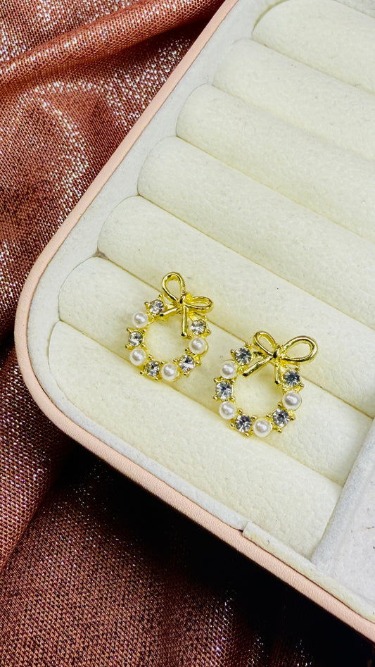 Aretes moños perlados