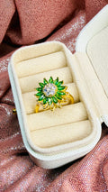 Anillo girasol verde giratorio