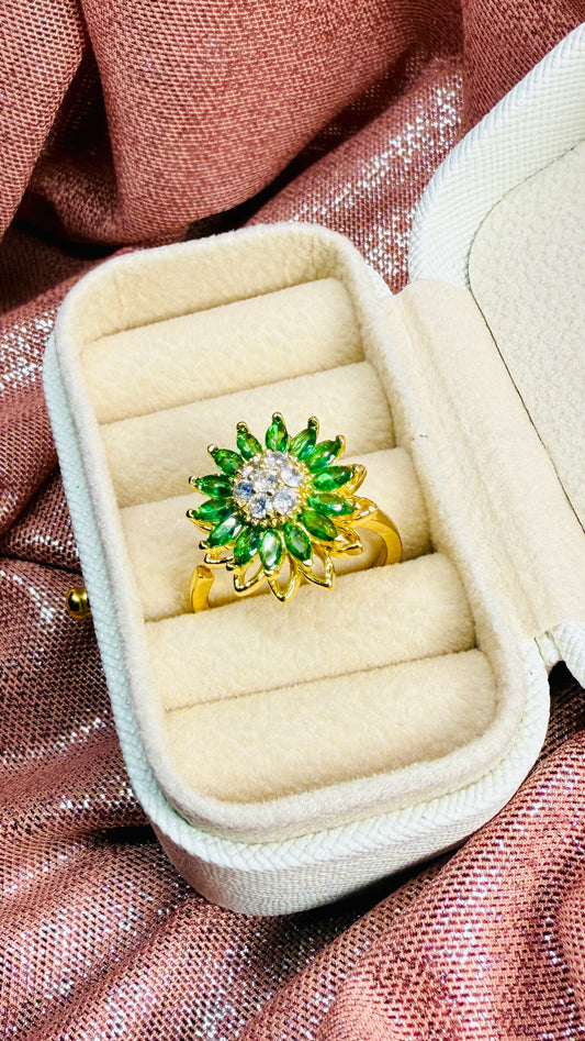 Anillo girasol verde giratorio