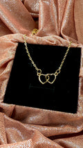 Collar corazones cruzados dorado
